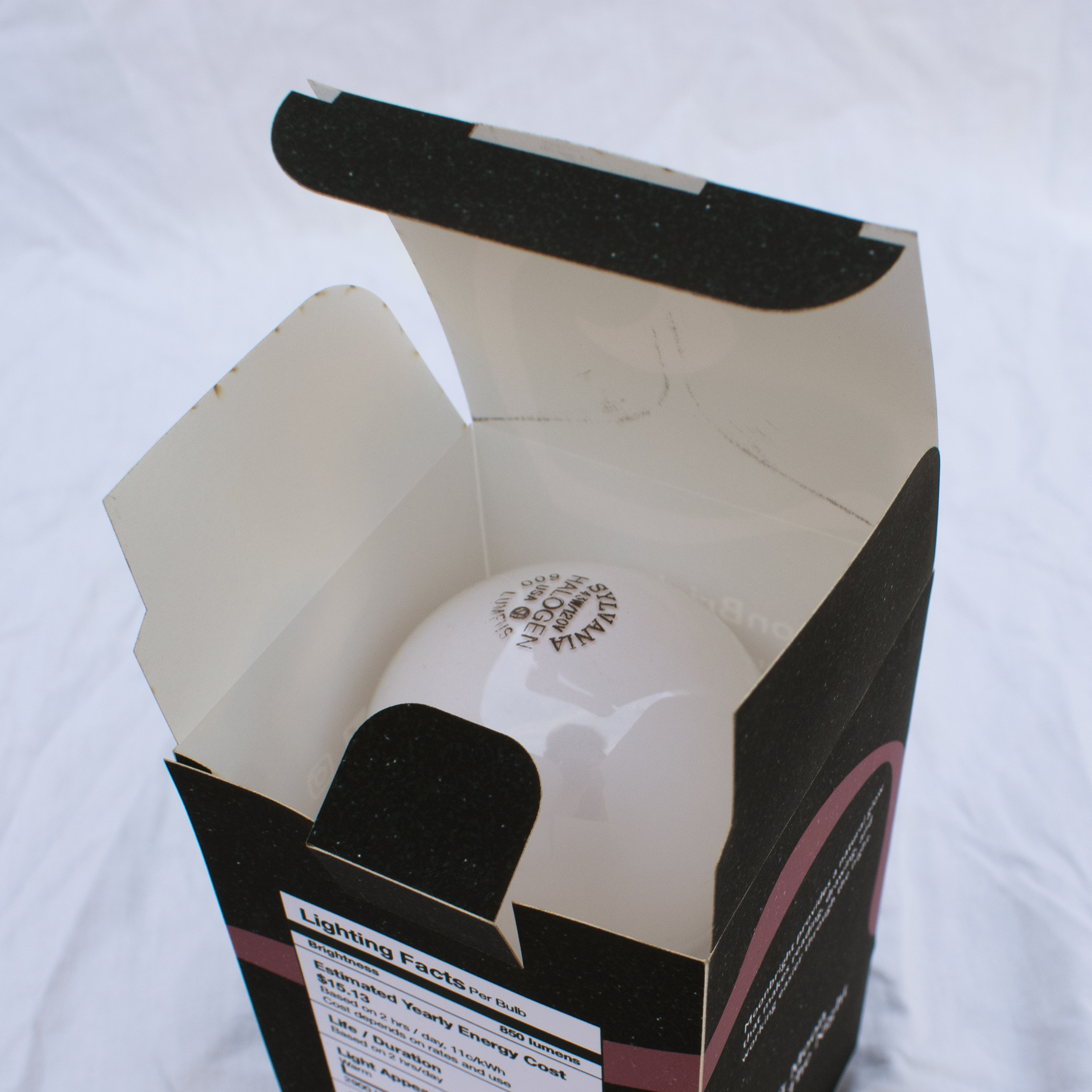 a lightbulb in a Luminova box